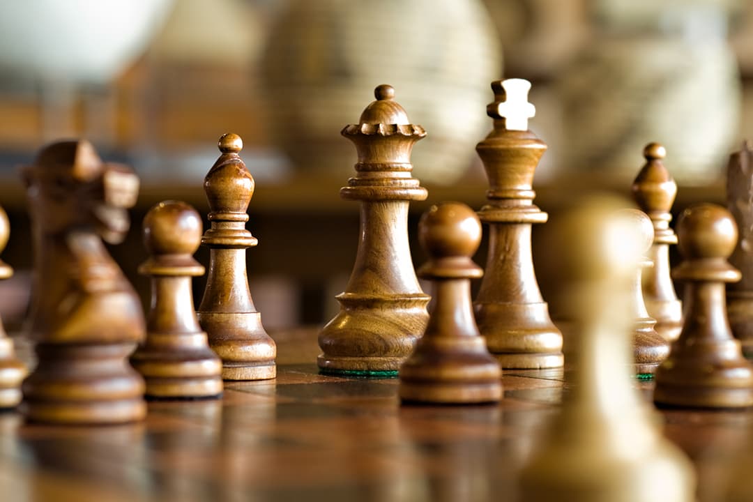 close-up of chessboard and pieces